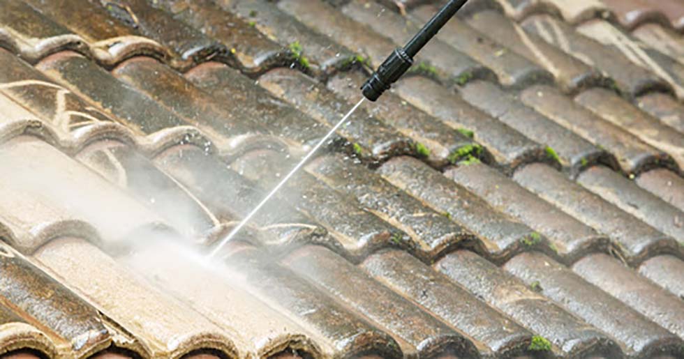 pressure washing roof in roof restoration